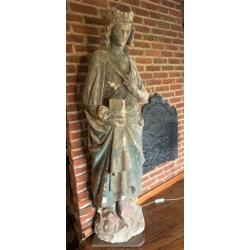 Ancienne statue de saint en pierre