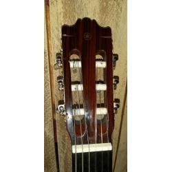 Yamaha g245s.