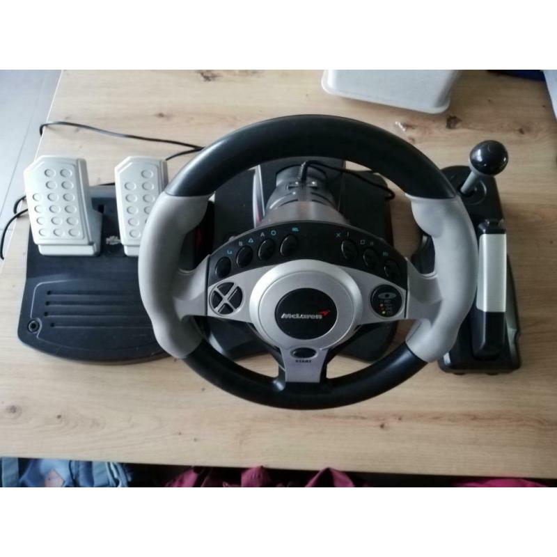 PlayStation 2 + racestuur + 18 games